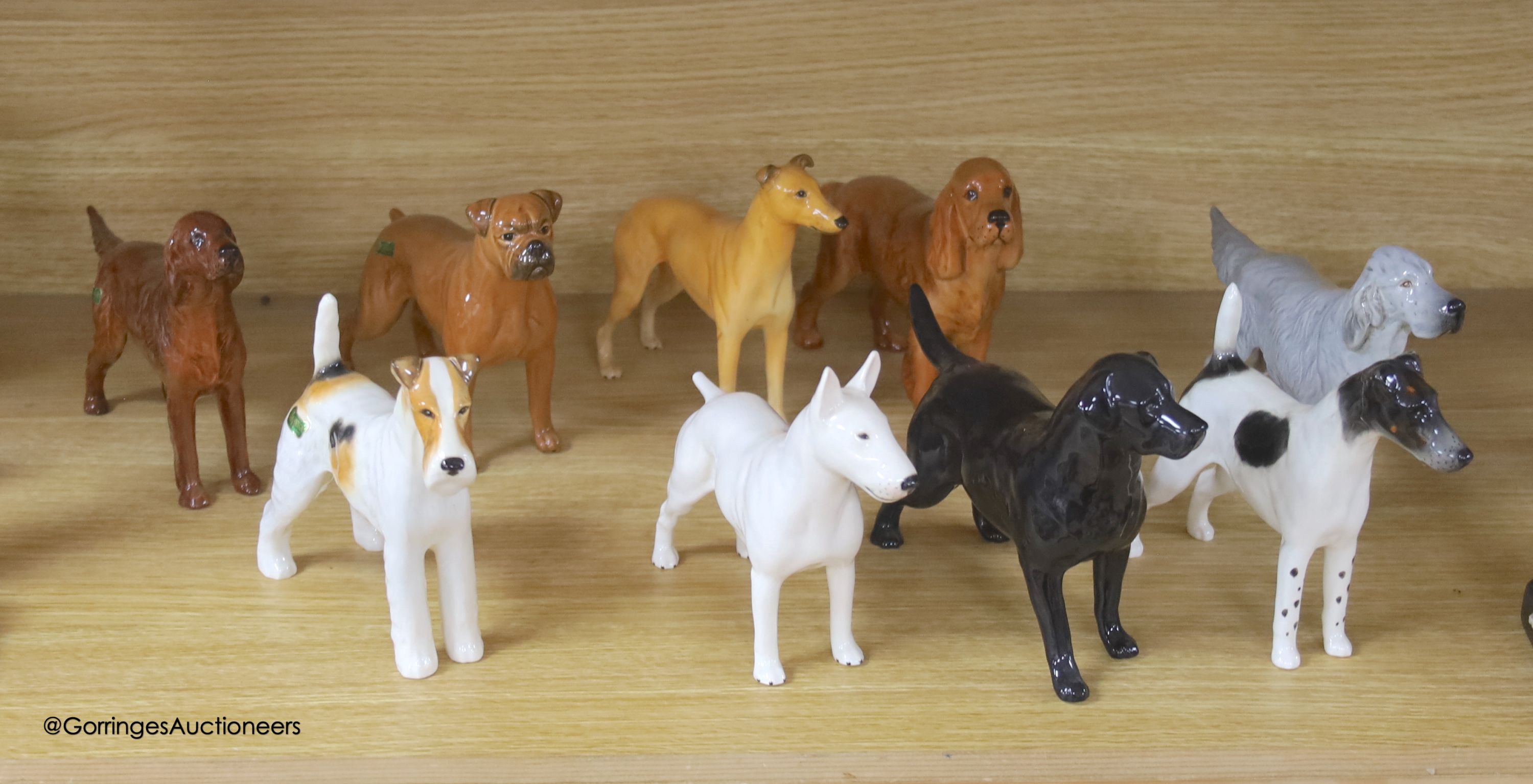 Nine Beswick pottery models of dogs